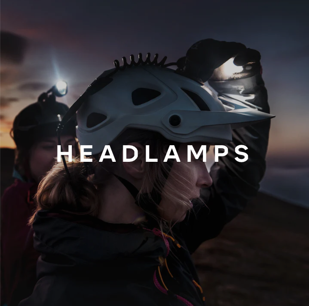 Silva headlamp being worn by a female mountain biker.
